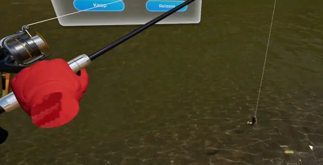 A gloved hand on the reel with the lure in the water below