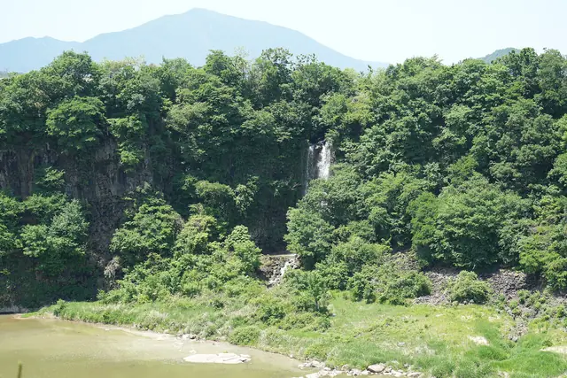 A waterfall dropping into the Hantan River gorge